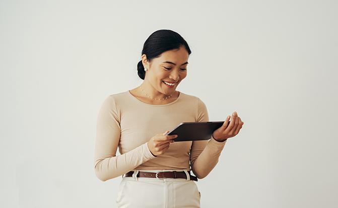 Woman holding a digital tablet